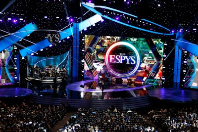 The 2020 ESPY Awards are going virtual. The two-hour broadcast, which will celebrate heroism and humanitarian aid, will air June 21 on ESPN; athletes Russell Wilson, Megan Rapinoe, and Sue Bird will host from their homes. The star-studded sports event had long been held at L.A.'s Microsoft Theatre in July; last year's 5,000-attendee show (pictured) focused on sustainability, inclusivity, and—of course—the United States women's national soccer team, fresh off its World Cup win. See more from the 2019 show here.