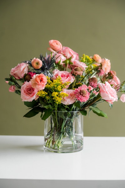Poppy at Home’s “My Girl” kit ($68) features roses, ranunculus, scabiosas, and solomios in shades of coral and blush, and yellow solidago aster.