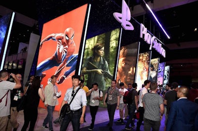 PlayStation drew attention to its booth with a series of massive panels that showed off colorful images from a variety of its upcoming games—including Ghost of Tsushima, Spider-Man, and Death Stranding. Large mirrors allowed the artwork to be seen from all angles. Also in the booth, a massive screen played clips and trailers from the highly anticipated game The Last of Us Part II, and additional decor was inspired by controller buttons. See more: E3 2018: 18 Unconventional Booth Ideas From the Splashy Video Game Expo