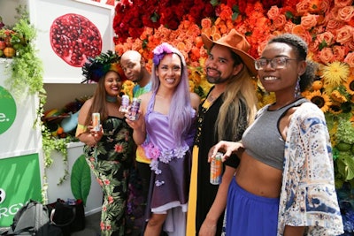 At NYC Pride’s 25th annual street festival, which was produced by KM Productions, sponsor V8 offered guests beverages at a colorful farmers market-inspired station. Guests could pose in front of a photo wall—designed by floral studio Iris and Virgil—that was created with different types of flowers and fruits that each represented a color of the rainbow.
