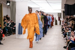 A model struts down the runway during the Richard Malone show in London in February, before the COVID-19 pandemic forced event cancellations.
