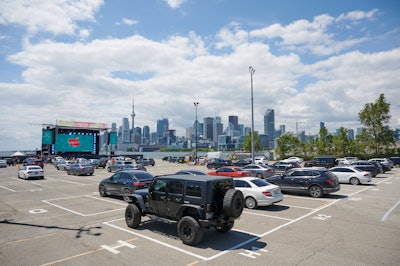 Toronto's CityView Drive-In Theatre—which takes over the parking lot for Rebel nightclub—opens tonight with a concert by Hamilton-area band Monster Truck. The venue houses about 200 vehicles in parking spots at least seven feet apart, all with views of a 238-foot stage with three LED screens. Future concerts will include Allan Rayman on July 18 and A Tribe Called Red on Aug. 6. The drive-in is being managed by INK Entertainment.