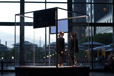 Originally staged at Brookfield Place in downtown Manhattan, The Attendants featured two performers confined in a giant Plexiglass cube.