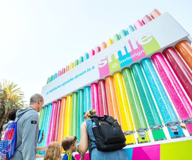 Invisalign activated outside the Anaheim Convention Center during the 10th edition of VidCon. Invisalign hosted a 15-foot-tall candy station, which featured 20 candy dispensers in the colors of the Invisalign logo. Each dispenser was custom-engineered by producers Mirrored Media to withstand the weight of the candy and the heat of the sun. See more: How VidCon Attracts 'the Most Media-Savvy Audience in the World'