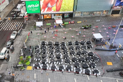 Vendors loaded in overnight to create the 'Empty Event' activation in Times Square. Each of the 48 tables represented 250,000 workers, totaling 12 million workers.