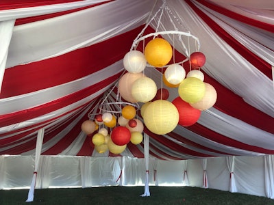 “The carnival was literally an empty field where we set up a tent and created an outdoor kitchen,” Bruner said. A 60-foot-by-70-foot tent was fully draped in red and white fabric.