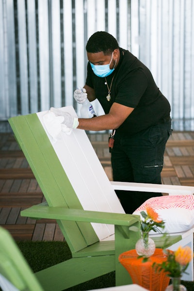 The sanitation staff was assigned to zones, responsible primarily for high-touch surfaces. The team wiped down chairs, tables, countertops, and other spaces immediately after use throughout the event.