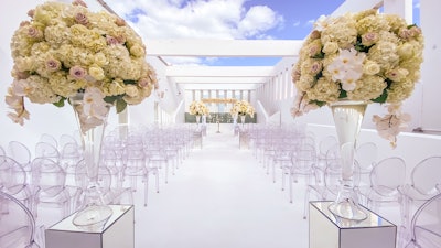 Stunning white wedding ceremony on the outside terrace at The Temple House.