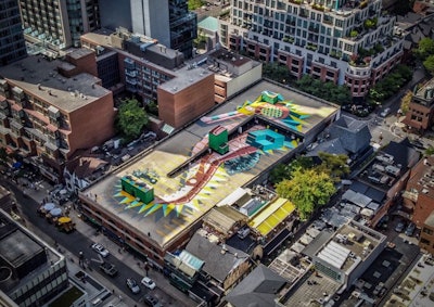 The second annual Yorkville Mural Festival displayed nine new works throughout the Bloor-Yorkville neighborhood, including a rooftop mural across the rooftop of the Cumberland Parkade by Toronto artist Birdo.