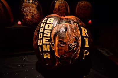 While several pumpkin displays repeated from previous years, there were also some new, timely ones—such as a hand-carved pumpkin honoring late Black Panther star Chadwick Boseman. The family-friendly event, which has a drive-through red carpet, has already drawn celebrities such as Kim Kardashian, Miley Cyrus, Demi Lovato, and Christina Aguilera.