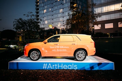 Hyundai cars such as the Palisade, Sonata, and Elantra were on display with custom wraps designed by the artists.