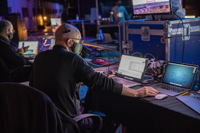 The event production crew backstage wore masks per the team's safety protocol. In addition, work stations were spaced six feet apart. The crew also staggered during meal times in order to ensure safe distancing during breaks.