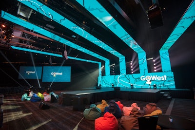 The main stage area included a mix of high-tops, couches, and beanbag chairs as seating.