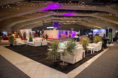 In the expo hall, organizers rotated the floor plan and widened the aisles to avoid the traditional grid layouts. Warm ambient lighting above was used to soften the space.