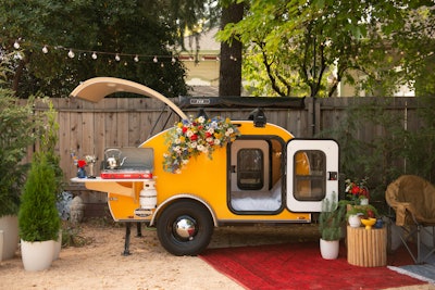Custom setups such as this one, with a teardrop trailer transported to California from Oregon, served as a creative photo-op background.