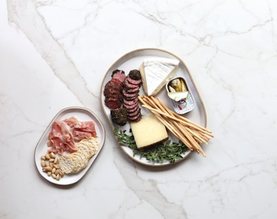 Ceramicist Jono Pandolfi has collaborated with top chefs to create custom handmade dinnerware for restaurants and hotels. Now, his new Toasted collection (from $40), which includes elegant oval platters, is available to class up a delivery order.