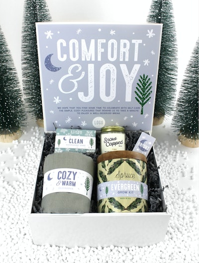 With 11 spots on which you can place yours or a client's company logo, the self-care-centric Comfort & Joy gift box ($75-$94) from Gifts for the Good Life is made for the corporate holiday season. The gift box features four options so you can send your client or employee the perfect pairing of products—choose from holiday-scented soap, a candle, box of matches, scarf, spruce grow kit, milk chocolate-mint cocoa mix, a deck of 52 gratitude cards, speckled campfire mug, and tea tin.
