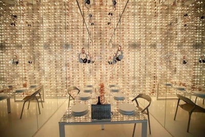 White vinyl records replaced plates and Skullcandy brand headphones dangled from above at the DJ-inspired Steelcase vignette designed by Gensler. See more: 20 Inspiring Decor Ideas From Diffa's Dining by Design in Chicago