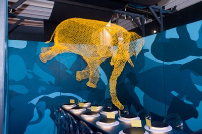 Pratt Institute students addressed the weighty subject of a HIV-positive diagnosis as the “elephant in the room,” interpreting the metaphor with this yellow chicken-wire sculpture of the animal. Place cards at each table setting included conversational phrases such as “We need to talk…” and “I have some news….” See more: 23 Inventive, Thought-Provoking Dining and Tabletop Ideas