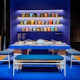 Novita Communications partnered with design studio Maiarelli Studio to create an installation that aimed to connect reading with the feeling of empathy. Instead of plates, open overturned books covering the topic of AIDS occupied the place settings, and stacks of books served as table legs.