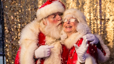 Santa Kissing Mrs