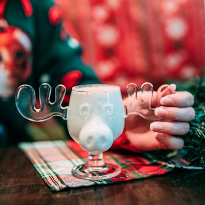Bartenders mixed up seasonal sips in on-theme glasses like the Christmoose Vacation made with Irish cream, amaretto, bourbon, Rémy Martin VSOP, demerara syrup, and heavy cream.