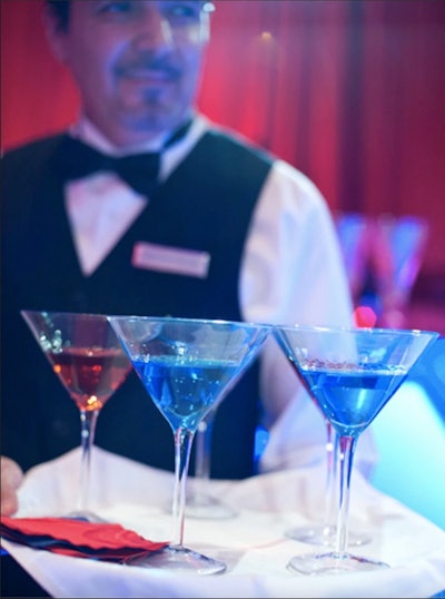 A patriotic cocktail hour fit with the theme, NACE Salutes the 1940s: Heroes to Hollywood, at the 2011 Capital Style Gala, hosted by the National Association of Catering Executives, in Washington, D.C. Take a tip from this past event and mix up a batch of red, white and blue martinis for your viewing squad. Cheers!