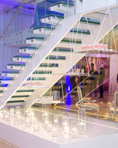 For an event held inside Chez in Chicago, Kesh Events tapped local rental company Northern Decor to get creative with a dessert station suspended from the venue’s staircase.
