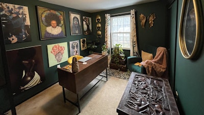 Roby says his home office features awards, small reminders of important things in his life, and artwork that helps him stay inspired and motivated while working from home.