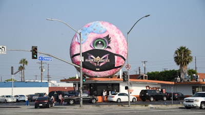 To generate awareness for The Masked Singer’s Emmy nomination, FOX and experiential agency Creative Riff teamed up to install one of the show’s characters, Miss Monster, in a branded face mask atop iconic landmarks on Los Angeles’s Santa Monica Pier. “The focus of the installation was to create a socially distant, impactful moment that also felt relevant to the times we are in,” explained Creative Riff CEO Ryan Coan. “We also hoped to brighten up some outdoor public spaces and remind people to stay safe in a fun, attention-grabbing way.”