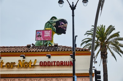 Because Miss Monster is a character from The Masked Singer that everyone already knows and loves, dressing her in a face mask was a natural design decision. Once the blueprints were set, local sign and banner service Big City Print manufactured the larger-than-life prop.