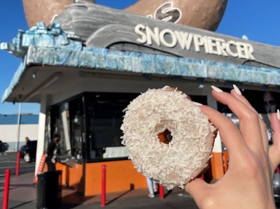 To top it all off, Randy’s offered a Snowpiercer-themed powdered sugar doughnut for Los Angeles customers to enjoy. “We wanted to create an out-of-home unit that would draw attention with a big train, ice and snow machines” said an executive at TNT on behalf of Snowpiercer. “Randy’s offered an iconic location we could take over with a safe, on-the-ground experience, too.”