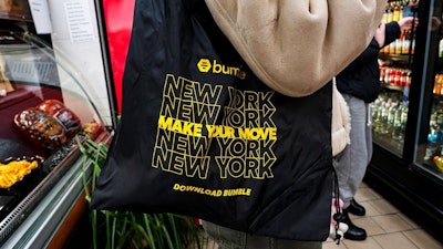 In addition to bacon, egg and cheese sandwiches, customers scored free branded tote bags.