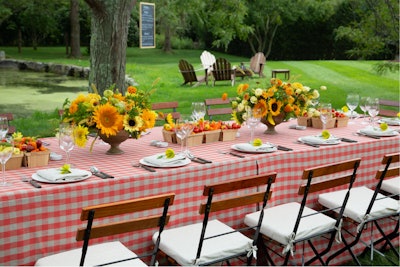 Last year, event designer David Stark centered this private event's design around a local farmer's market bounty, with baskets of fresh fruits and vegetables, and blooming sunflowers to boot. See more from: Send Off Summer With Inspiration From This Outdoor Social Event