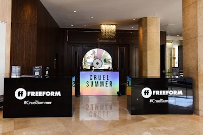 When guests entered the Beverly Hilton, they were directed to socially distanced counters for contactless check-in. A CD-inspired DJ booth set the tone for the event’s 1990s theme.