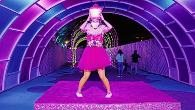 Find costumed performers on curated stages throughout the installation. These colorful characters engage and interact with guests from a distance through impromptu dance routines as well as juggling and hula hooping acts.