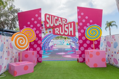A larger-than-life Sugar Rush archway welcomes guests into an immersive candyopolis that’s not your average candyland-style experience. “There are some really unique, abstract and funky installations,” explains Smith. “This isn’t an ‘IG museum’ where carefully curated photo ops are what stand out, because the entire set at Sugar Rush, from start to finish, is the hero shot. We leave it to the guests to curate their own content and imagery inside.”
