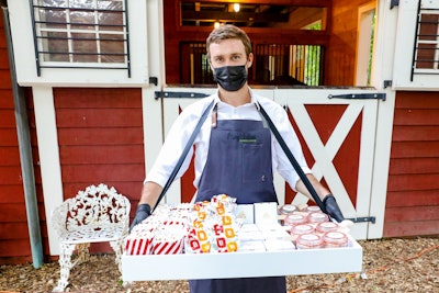 For live events, Mary Giuliani Catering & Events in New York is serving up individually packaged mini sliders, bags of chips and cheese plates. Other menu options include personal popcorn and pizza boxes, mini hot dog kits with single-serve condiments and s’mores in a jar. See more: 15 Low-Touch, High-Taste Catering Ideas for Live and Virtual Events