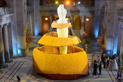 Celebrating the New York institution's spring exhibition, Charles James: Beyond Fashion, the 2014 Met Gala took its cues from James, a 20th-century American couturier recognized for his sculptural ball gowns and innovative tailoring. The centerpiece? A 30-foot-tall rose-covered mannequin and gown towering in the Great Hall. See more: See the Met Gala's Towering Rose Sculpture