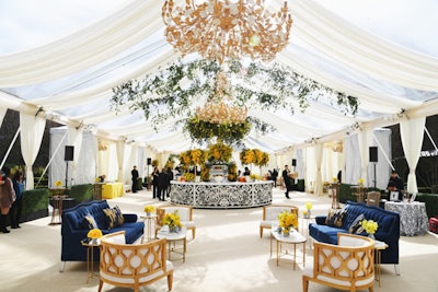 For Roc Nation's annual brunch, held the day before the 2019 Grammys, SO Events created an Italian garden theme inside a white tent. Overhead, floral chandeliers and hanging greenery added a vibrant, summery touch. See more: 5 Event Design Trends From Award Season's Coolest Parties