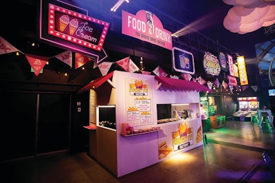 In Montreal, Total Events brought a boardwalk carnival inside a local performance art theater with food vendors, custom carnival signage and classic boardwalk photo ops.