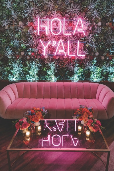 When looking to revamp its lounge, Nolé Restaurant in New Orleans tapped local event production company Wink Design & Events for a midcentury seating area complete with florals and custom neon signage.