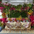 In 2018, Luxe Linen asked local designers and florists to create a tablescape around a swatch of fabric from its colorful new line of linens. Held for the first time at the Petersen Automotive Museum’s rooftop, the product launch drew more than 400 high-end event planners, designers, florists, members of the media and more. Designed around Luxe’s bright new Riley linen, this vibrant, summery table was a team-up between Jennifer Naylor Catering & Special Events and Mark’s Garden. See more: Get Inspired by 15 Colorful Twists on a Tropical Theme