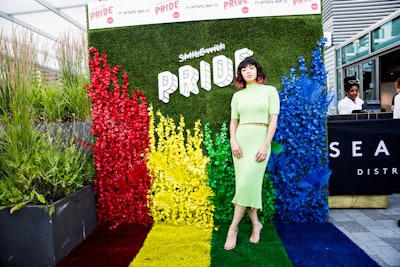 Another creative use of florals at Pride 2019 came from The Artists Den, an ongoing TV and music series, which held a WorldPride edition in New York that was headlined by pop artist Charli XCX. The event, which was sponsored by Colgate, featured a “Smile with Pride” step-and-repeat wall with florals and plants painted in red, yellow, green and blue, extending to a grass floor. Artists Den partnered with Cogent to design Colgate’s activations at the event. See more: Pride 2019: 28 Thoughtful and Colorful Ways Brands Supported the L.G.B.T.Q. Community