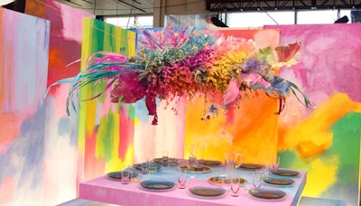 Dining by Design’s 10th year of co-location with the Architectural Digest Design Show took place in 2019 at Pier 92 in New York. Shown here, first-time participant INC Architecture & Design’s “Us Is More” dining vignette was a playful kaleidoscope of colorful patches on the walls with a rainbow-bright ceiling installation. See more: 18 Dining and Tabletop Ideas From Diffa's 2019 Dining by Design