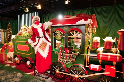 For the 2020 holiday season, Fashion Show Las Vegas hosted two walkthrough experiences, including one through Santa's Workshop that features Mrs. Claus and her elves—wearing masks, of course.