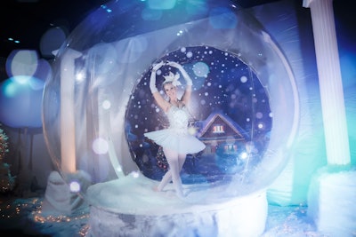 A 'Winter Wonderland' walkthrough had snow-white trees, ice sculptures and snow flurries, all leading up to a giant snow globe featuring a live ballerina.