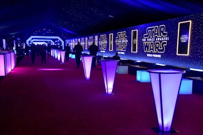 How do you pull off the ultimate Star Wars themed event? You take a tip from the experts! At the world premiere of Star Wars: The Force Awakens, event organizers lined the lounge area with futuristic high-boy tables that glowed purple, while themed branding and galaxy-inspired projections covered the walls and ceiling. Looking to recreate the decor at home or on a smaller scale? BlissLights' Sky Lite LED laser star projector ($49.99) should do the trick.
