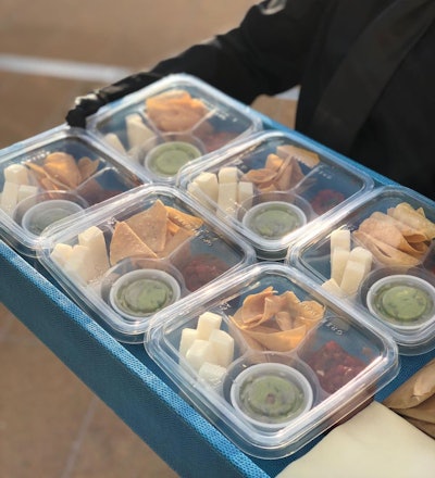 During an event held at Lincoln Center in New York last week, CxRA (aka Catering by Restaurant Associates) brought guests chips and dip in a 'COVID-friendly' manner with individually packaged meal boxes.