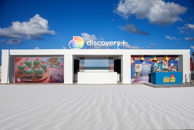 Discovery+’s activation, designed and produced by CHCre8tive with fabrication by Funkshion Miami, featured a 10-by-15-foot LED wall that showcased a sizzle reel of Discovery+’s shows. A highlight was an interactive video booth showcasing Duff Goldman’s new show Duff’s Happy Fun Bake Time. The colorful booth from LA Photo Party and SoBe Photo Booth Company included characters from the show and a re-creation of the show set.